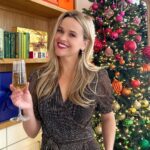 Reese Witherspoon Instagram - Bringing that holiday magic 🥂 (and serving up gift guides) 🎁 Link in bio for more!