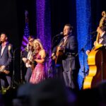 Rhonda Vincent Instagram - 🎧: @rhondavincent // @adamhaynes4 🎻🎻 📍: @industrialstrengthbluegrass 📸:l @xlacimack #rhondavincent #fiddle #twinfiddles #bluegrassmusic #pinkdress #marthawhite Industrial Strength Bluegrass
