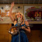 Rhonda Vincent Instagram - This is the way you hold a @bluechippicks - all while cradling your @daddarioandco Strings and projecting your voice through your favorite @shure KSM44 microphone! #ThatsTheWayYouDoIt 😁
