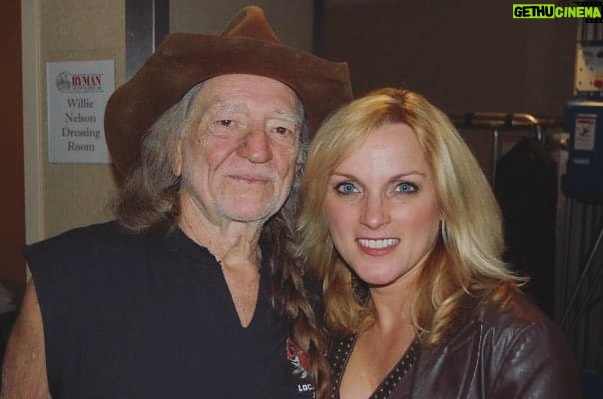 Rhonda Vincent Instagram - 14 years ago today - Friday, November 6, 2009 - The day I met #WillieNelson @willienelsonofficial when we opened a show for him @theryman With great anticipation, we took the stage. The house lights were up and never dimmed as we started the set with our bluegrass “Song of the Year” - Kentucky Borderline. People were milling about, barely applauding, and barely listening. Since we don’t use a set list, it became a challenge to find the right song that the audience might react to. We played another song of the year - Is The Grass Any Bluer on the Other Side. Still no response, so I decided on one of the fastest songs we do, sang by Mickey Harris - Lost All My Money But A Two Dollar Bill”. That was the magic song that turned things around. They immediately started listening and the response was amazing. They were intently listening, so now the new challenge would be how they would react to an accapella gospel song “Fishers of Men”. It worked!! Standing ovation at the Ryman. Sometimes you just gotta find the right song. I was honored to record with Willie on two of my albums. His line on the Christmas project “Eleven pipers piping” on the Twelve Days of Christmas is the BEST! He also sang a duet with me on the song “Only Me”, singing and playing guitar!! Willie — you are amazing and I’m honored to have these opportunities. Thank you!! Ryman Auditorium