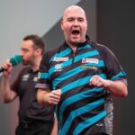 Rob Cross Instagram – HIGH VOLTAGE! 
Rob wins the Interwetten European Darts Grand Prix, beating Luke Humphries 8-6 in the final. 
It means Rob wins his first ET title, stays at World No.5 and will represent England in the World Cup 🏆 
@targetdarts @NamosSolutions @jenningsbetinfo @scott_rbs