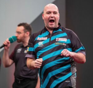 Rob Cross Instagram - HIGH VOLTAGE! 
Rob wins the Interwetten European Darts Grand Prix, beating Luke Humphries 8-6 in the final. 
It means Rob wins his first ET title, stays at World No.5 and will represent England in the World Cup 🏆 
@targetdarts @NamosSolutions @jenningsbetinfo @scott_rbs