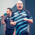 Rob Cross Instagram – Back on stage today at the Blåkläder Belgian Darts Open. I play Stefan Bellmont this afternoon. Need to get a few wins this weekend 💪
Thanks for the support, means a lot ⚡️
@targetdarts @NamosSolutions @jenningsbetinfo @scott_rbs 

📸 @_taylorlanningphotography_