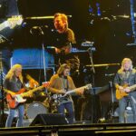 Rob Liefeld Instagram - Joy and I caught the Eagles last night for their final L.A. show at the Forum. Saw this GIANT in the front row and knew he was familiar…so great running into Marc & Bridgette Silvestri there. I’ve seen the Eagles at least ten times since they reunited in 1994, almost all with Joy, my favorite band. The music I was raised on. They are still as tight as they’ve ever been. Don Henley still has that golden voice, even at 72. Joe Walsh still shreds on his guitar. Timothy has that great range. Vince Gill feels like he’s been in the band forever and we saw Deacon Frey debut at Dodgers Stadium in 2017 and at times he looks and sounds just like his Pops. If you can catch em, you won’t regret it! #eagles