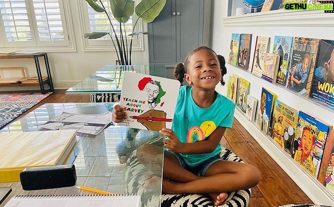 Rockmond Dunbar Instagram - Posted @withregram • @mrs_maya_dunbar We've started our journey of learning/appreciating who Marcus Mosiah Garvey was and what he stood for. @jameswrites615 book Teach Me About Garvey makes me cry EVERY. SINGLE. TIME. It's poetic and simple in its presentation which allows easy digestion for younger kids yet still so immensely powerful & moving. Thank you brother James, our elder Marcus is shining his light down on you!! Berkeley is loving cursive writing and determined to master this lost writing technique. Which I'm grateful for because I too love to write in cursive. It can be so beautiful. Thanks to @blossomandroot for our 'we come from stardust' nature project which saw us create a nature mobile to help understand the cosmos and the role the sun along with the planets our solar system. And of course, a big shoutout to @singaporemath for the fun & challenging dimensions 1st grade math. I'll say this as we approach the end of our 2nd month of homeschooling---every bump in the road along the way is 100%%%% worth it when I see/hear Berkeley apply the concepts/history etc she's learning in every day life. To watch her mind, knowledge and capacity for learning expand right before my eyes has been a treasure to see. That's not to say we don't bump heads at times, or there aren't struggles in this process but I'd rather deal with those than what is created when a black child is indoctrinated their entire life by a white supremacist educational system. You may be successful, even wealthy...but the mental shackles placed on the mind do irreparable damage to the psyche and soul. Never permitting the black adult to fully embrace, nor understand our history, culture, nor our fully realized greatness. Therefore incapable of fully grasping the systems in place created to intentionally keep us in 'our place.' Imagine celebrating your ancestors oppressors: religion, holidays, culture and history while turning your nose down at your own! This will be the greatest gift I can leave these children with. A 150%%% FREE MIND! #blackhomeschoolers #blackhomeschooling #blackhomeschool365 #blackhistoryisamericanhistory #blackhistory365 #education #homeschool #marcusgarvey #amoswilson