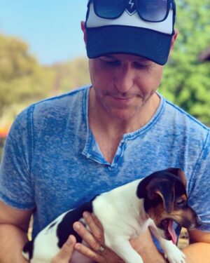 Rodger Corser Instagram - Meet “Eddie”, the newest member of our family.  We did say no more kids a few years back...but we had to make an exception for this little guy.
Thanks to our great friend Simmy @wanderingozzie_ who hosted us at her place in Coffs and help twist my arm to adopt the brother of their newest addition “Kevin”. Looking forward to reuniting our Jack Russell x Dachshund brothers, Ed & Kev very soon!! #puppylove🐶 #jackweenie #jackshund #ithoughtwewerepasttoilettraining #obviouslynot