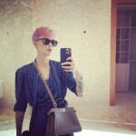 Ruby Rose Instagram - Peekaboo NYC. 🥰😍 I love the fall. X Thank you @fendi @silviaventurinifendi @mrkimjones #fendipeekaboo #ad Image description Slide one: I am standing in a NY street, next to a potted plant and a stairway. I’m wearing a new bag and my hair is pink and my heart is full. Slide two: Someone ( a friend of mines son ) asked me to wear this dress, I’ve never worn a wrap dress and put it on back the front originally.. I corrected it for this photo. I have sunglasses on, but am inside, don’t judge me. Slide three: I am sitting in a taxi cab, petting my new bag because I’m a little awkward.