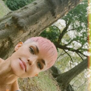 Ruby Rose Instagram - New York minute. 
Really fell in love with New York again this trip. Falling in love with my self again has allowed me to fall in love with so much more. Also thank you @ryantrygstadhair .. you knew I needed some love and a little glamor in my life and the cut and color you did really made me look how I feel inside. 🥰 
I don’t want to leave .. but alas this next week is going to be beautiful, truly. ADVENTURES ONLY. 
Also for fellow people who may have .. I don’t know.. not left the house In months.. it isn’t as scary as you think, I went to the park before I could do the crowds. I bought sunglasses and basically dropped my bag and all it’s contents all over  bergdorf Goodman’s floor. I almost left a taxi without paying because I  forgot it’s not Uber and I kept asking everyone if I was allowed to touch things in store because I don’t know anymore with Covid lol. But I’m full. So full. So give it a go if you can.

Image description:

Slide one

I am standing in front of an elevator, taking a photo through the Mirror, I cut my hair and dyed it a light soft pink. I’m happy. 

Slide two 

I am laying in the park, resting, there are beautiful trees everywhere around me ( not pictured )

Other slides: 
Basically more photos of my hair 😂