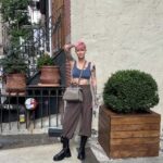 Ruby Rose Instagram - Peekaboo NYC. 🥰😍 I love the fall. X Thank you @fendi @silviaventurinifendi @mrkimjones #fendipeekaboo #ad Image description Slide one: I am standing in a NY street, next to a potted plant and a stairway. I’m wearing a new bag and my hair is pink and my heart is full. Slide two: Someone ( a friend of mines son ) asked me to wear this dress, I’ve never worn a wrap dress and put it on back the front originally.. I corrected it for this photo. I have sunglasses on, but am inside, don’t judge me. Slide three: I am sitting in a taxi cab, petting my new bag because I’m a little awkward.