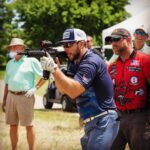 Ryan Merriman Instagram – Oh hey @risearmament…is that the fastest civilian shooter at the tourney? Hahah😁!!! @foldsofhonor @patriotcup #freedomisntfree What a great weekend thank you again for supporting such a great cause. Nevermind the tongue 😜