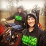 Ryan Merriman Instagram – I come home for a week and pop puts me to work🤣….and no we didn’t plan the outfits! #bestdadever #reddirt #tgif #countryboy #goodtimes #carhartt