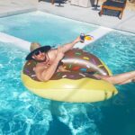 Ryan Merriman Instagram – When it rains in Burbank….you head to Palm Springs👍🍻 #tgif #floaties #floatgame #homefortheweekend #hakunamatata