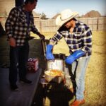 Ryan Merriman Instagram – Me and pop gettin it done yesterday👊👍. If you’ve never had a fried Turkey….you’re missing out! #family #football #friedturkey #ilovemydad #blessed #countryboy #flannel was required btw😁