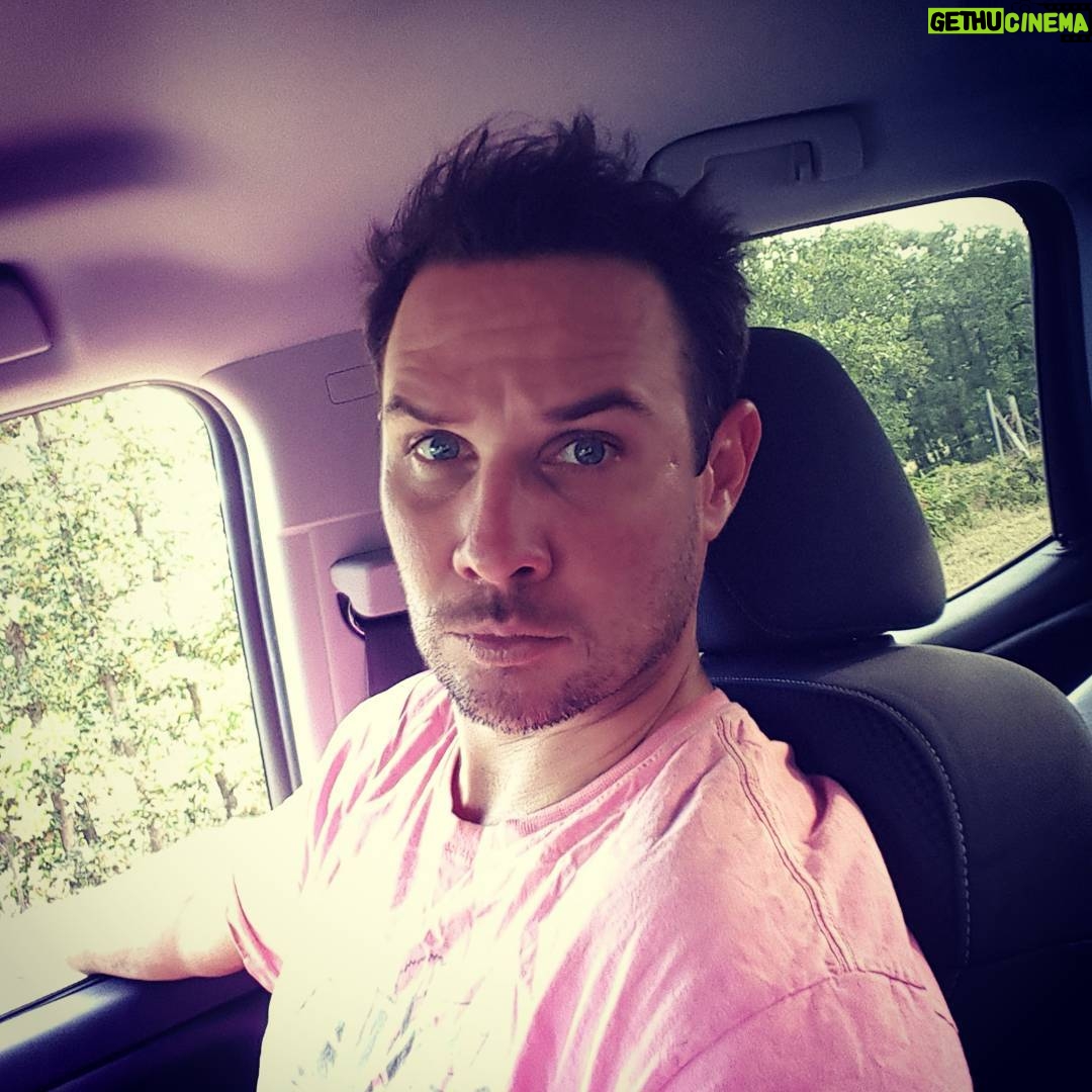 Ryan Merriman Instagram - The look you give the weather man when he lies about how hot it was gonna be!!👎#hardwork #sweaty #realmenwearpink #countrymusic #truckselfie #reddirt #hurryupfall #prolawns.