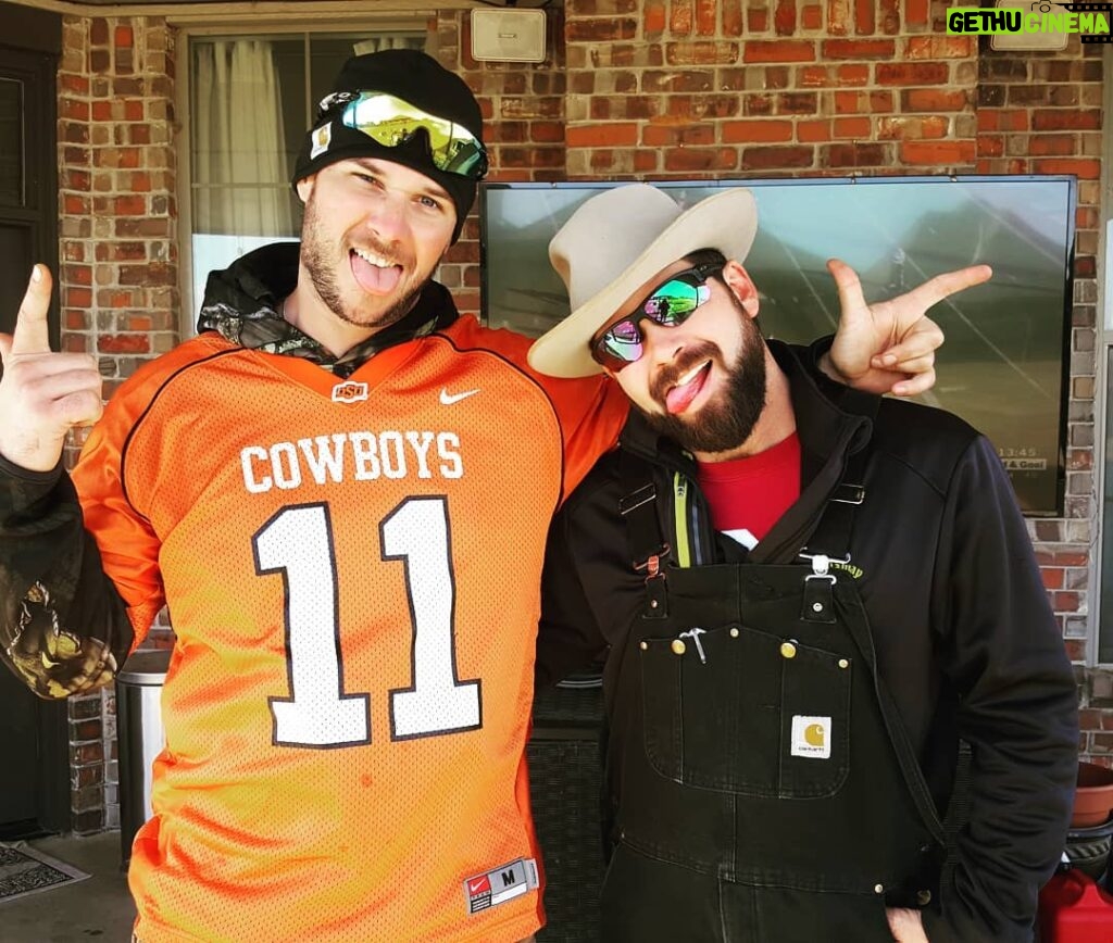 Ryan Merriman Instagram - My best friend my whole life and he always wins this bet...lets see who gets the victory Hundie this year! #bedlam #gopokes #goodtimes #friends #family #cornhole #campfire