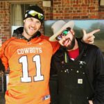 Ryan Merriman Instagram - My best friend my whole life and he always wins this bet...lets see who gets the victory Hundie this year! #bedlam #gopokes #goodtimes #friends #family #cornhole #campfire