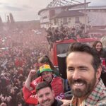 Ryan Reynolds Instagram - The first Tuesday in May. What an unforgettable evening in Wrexham celebrating both @wrexham_afc and @wrexhamafcwomen gaining promotion and winning their leagues. BONKERS ⚔️❤️⚔️