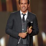 Ryan Reynolds Instagram - Thank you @peopleschoice for the 2022 Icon Award. Next year I’m gunning for Supporting Icon. Thank you to my friend, @comedianlilrel for the intro and kind words. And if you saw my speech, and you want to work in the same business as me but didn’t think there was room for you at the table, check out our two organizations, @groupeffortinitiative and @creativeladderorg. These non-profit organizations are awesome and here to help. Last night was amazing. Thank you, @thombrowne for this incredible suit. Thank you @vivianbaker for making me look three weeks younger. 💥💥