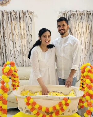 Sai Lokur Instagram - Happy and proud new parents😇❤️🧿

#babyroy #namingceremony #babygirl #princess #angel #babynamingceremony #babynames