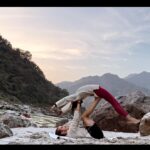 Sakshi Pradhan Instagram - #Balancing amidst the #sacred #energy of the Ganga, I find solace in the #fluid #dance of yoga poses. Each stretch and breath becomes a mindful communion with the river's #timeless flow, #grounding me in the present #moment . In this sacred space, the union of body and spirit #echoes the harmony of nature, a poignant reminder to be fully present in the #embrace of tranquility. 🧘‍♀️🧘🌊 #YogaByTheGanga #MindfulnessJourney #FlowingInHarmony #yoga #goat #tranquility #Peace Uttarakhand