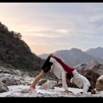 Sakshi Pradhan Instagram - #Balancing amidst the #sacred #energy of the Ganga, I find solace in the #fluid #dance of yoga poses. Each stretch and breath becomes a mindful communion with the river's #timeless flow, #grounding me in the present #moment . In this sacred space, the union of body and spirit #echoes the harmony of nature, a poignant reminder to be fully present in the #embrace of tranquility. 🧘‍♀️🧘🌊 #YogaByTheGanga #MindfulnessJourney #FlowingInHarmony #yoga #goat #tranquility #Peace Uttarakhand