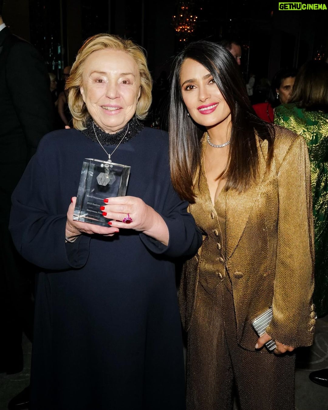Salma Hayek Pinault Instagram - I would like to congratulate my incredible Mother-in-law Maryvonne Pinault on receiving the prestigious Hadrian Award by the World Monuments Fund for her outstanding dedication to the restoration of iconic monuments around the world . Bravo, may your legacy continue to shine as brightly as the monuments you've helped restore! Je tiens à féliciter mon incroyable belle-mère Maryvonne Pinault pour avoir le prestigieux prix Hadrian du World Monument Fund célébrant son engagement exceptionnel depuis toujours pour la préservation du patrimoine mondial. Bravo, que votre oeuvre continue de briller aussi fort que les monuments que vous avez contribué à restaurer! Me gustaría felicitar a mi increíble suegra Maryvonne Pinault por recibir el prestigioso Premio Adriano de parte del World Monuments Fund por su destacada dedicación a la restauración de monumentos icónicos alrededor del mundo. ¡Bravo, que tu legado siga brillando tanto como los monumentos que has ayudado a restaurar! @worldmonumentsfund #hadrianaward Outfit: @brioni_official Makeup: @genevieveherr Hair: @jennifer_yepez Jewellery: @boucheron Facial: @joannavargas @joannavargasnyc Nails: @leonobi_galvez