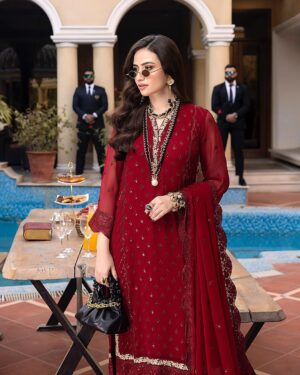 Sana Javed Instagram - The Scarlet outfit from the latest @shahzeb_textile_official Merakish volume-4 collection is an absolute stunner! The Scarlet outfit exudes elegance and sophistication, while still managing to remain trendy and fashionable. The sequin embroidery adds just the right amount of sparkle and glamor, without being too over-the-top or gaudy. I am excited to wear & flaunt the beautiful dress again! Highly Recommended.  View more collection by shahzebtextile: www.shahzebtextile.pk #luxurycollection#chiffon#newcollection #clothingmanufacturer #live #now #clothingcompany #clothing #clothingbrand #apparelbrand #merakish #chiffon #embroidered #shahzebtextile #merakish4