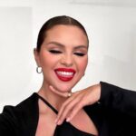 Selena Gomez Instagram - A red lip is an instant confidence boost for me, and I wanted to share that empowering feeling with you. ❤️ That’s why I created the limited edition @rarebeauty Kind Words Matte Lipstick in Devoted, a true red that’s flattering on all skin tones.​ ​ 100% of sales will go to the Rare Impact Fund to increase access to mental health services and education for young people around the world. Available exclusively at RareBeauty.com
