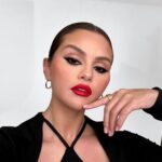 Selena Gomez Instagram - A red lip is an instant confidence boost for me, and I wanted to share that empowering feeling with you. ❤️ That’s why I created the limited edition @rarebeauty Kind Words Matte Lipstick in Devoted, a true red that’s flattering on all skin tones.​ ​ 100% of sales will go to the Rare Impact Fund to increase access to mental health services and education for young people around the world. Available exclusively at RareBeauty.com