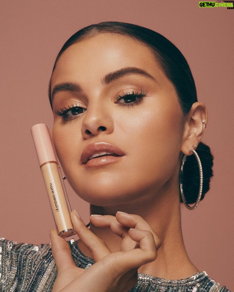 Selena Gomez Instagram - Meet my new Positive Light Under Eye Brightener. This super lightweight formula instantly brightens, hydrates, and awakes your under eyes. You can wear it on its own or layer it over your concealer for an extra brightening effect.    Shop it for the next 24 hours, today only on Sephora.com. It will be available @Sephora, Sephora at @Kohls, and RareBeauty.com on December 23rd and @spacenk on December 26th.