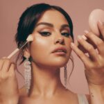 Selena Gomez Instagram - My new @RareBeauty Positive Light Silky Touch Highlighter & Brush is here. It feels like silk on your skin and is super lightweight -never seen a highlighter like this before. Available tomorrow or shop it early now only on the @Sephora app.