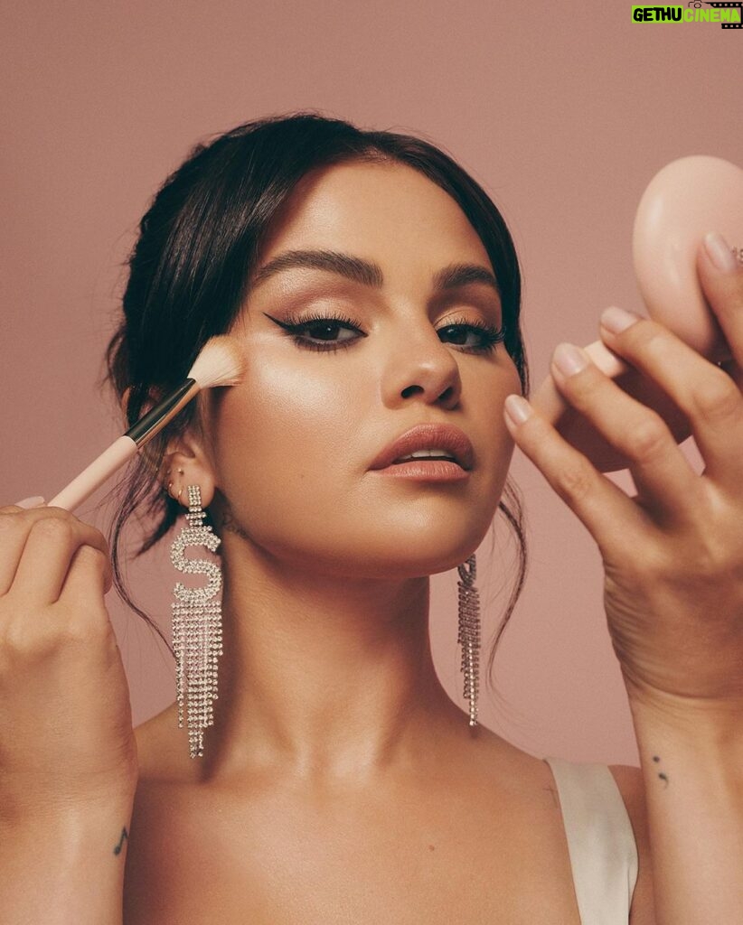 Selena Gomez Instagram - My new @RareBeauty Positive Light Silky Touch Highlighter & Brush is here. It feels like silk on your skin and is super lightweight -never seen a highlighter like this before. Available tomorrow or shop it early now only on the @Sephora app.