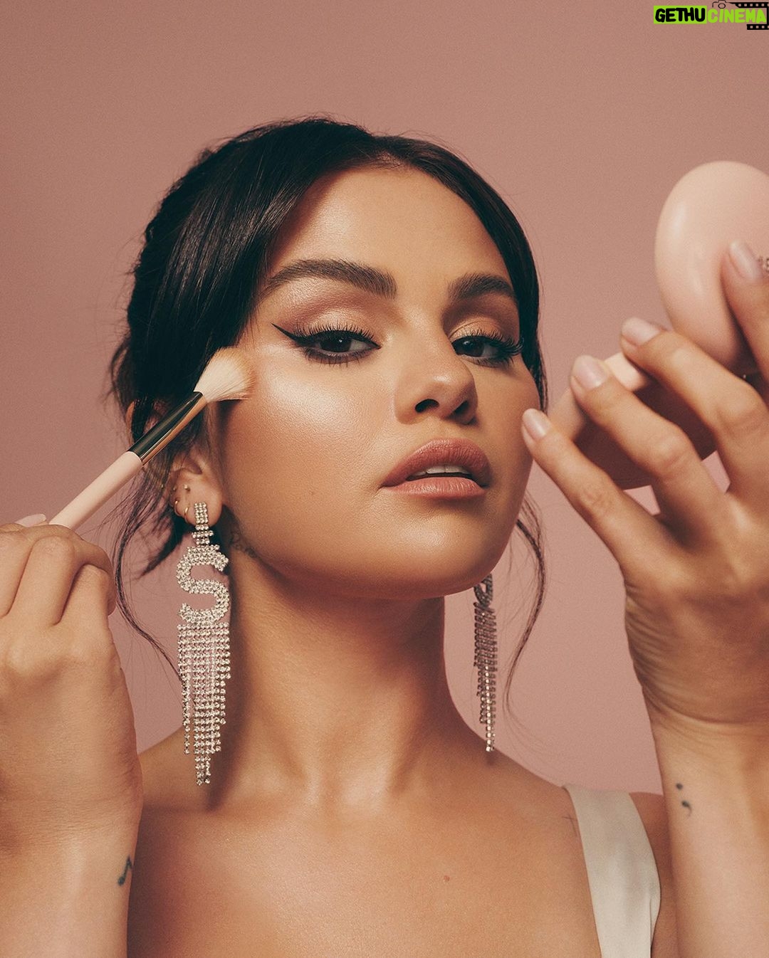 Selena Gomez Instagram - My new @RareBeauty Positive Light Silky Touch Highlighter & Brush is here. It feels like silk on your skin and is super lightweight -never seen a highlighter like this before. Available tomorrow or shop it early now only on the @Sephora app.