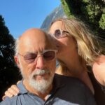 Sheila Kelley Instagram - How do you love each other? I just held a workshop on how to amplify your masculine and feminine energy to love deeper. There were 3,000 people on the @mindvalley zoom call. It was so beautiful to watch the chat fly by with humanity, love, respect, and intrigue. What touched me the most were the comments asking for more clarification about love. About being seen in a world that is full of “too much”. Too much input, too much advice, too much direction, too much angst, too much desperation. It’s simple really: Love lives in the quiet moments of connection between you and your beloved. And when I say “your beloved” I am referring to any person with whom you share any kind of love. It could be the love between friends or the love between lovers. But the knowing connection in eye to eye contact - that moment where you spend an extra two seconds looking into each other’s souls, that moment is sizzling, and heart opening and soul inspiring. Try it today. Maintain eye to eye connection with someone and feel your entire being elevate for just that moment. But know the impact will ripple throughout your life. ⠀⠀⠀⠀⠀⠀⠀⠀⠀ For us it’s a New year, deeper love. ❤️❤️❤️ ⠀⠀⠀⠀⠀⠀⠀⠀⠀ If you want to know more about how we love and have loved for 34 years? Comment with a kiss below… 💋 And ask me anything you’d like!