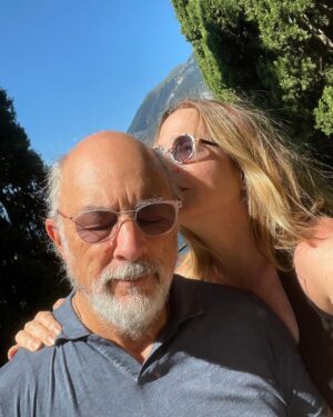 Sheila Kelley Instagram - How do you love each other? I just held a workshop on how to amplify your masculine and feminine energy to love deeper. There were 3,000 people on the @mindvalley zoom call. It was so beautiful to watch the chat fly by with humanity, love, respect, and intrigue. What touched me the most were the comments asking for more clarification about love. About being seen in a world that is full of “too much”. Too much input, too much advice, too much direction, too much angst, too much desperation. It’s simple really: Love lives in the quiet moments of connection between you and your beloved. And when I say “your beloved” I am referring to any person with whom you share any kind of love. It could be the love between friends or the love between lovers. But the knowing connection in eye to eye contact - that moment where you spend an extra two seconds looking into each other’s souls, that moment is sizzling, and heart opening and soul inspiring. Try it today. Maintain eye to eye connection with someone and feel your entire being elevate for just that moment. But know the impact will ripple throughout your life. 
⠀⠀⠀⠀⠀⠀⠀⠀⠀
For us it’s a New year, deeper love. ❤️❤️❤️ 
⠀⠀⠀⠀⠀⠀⠀⠀⠀
If you want to know more about how we love and have loved for 34 years? Comment with a kiss below… 💋 And ask me anything you’d like!