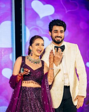 Shrenu Parikh Instagram - All that Glitters is not gold it’s “BLING” 🥰💍🧿
.
#LoveAtFirstTake 
.
Bride’s look designed , Styled By & Makeup💄 By :- @nehaadhvikmahajan 
.
Hair by @mmtimemachine @timemachinebrides 
👗Outfit:- @neerusindia 
.
💎Jewellery:- @khuranajewelleryhouse 
.
🥼groom’s outfit:- @runit_gupta 
.
📸photography:- @oragraphy @canonindia_official 
.
Event managed and decor by:- @thetuliptouch