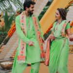 Shrenu Parikh Instagram - The start of a new chapter , sealed with Haldi 💛 💚 Love, laughter and family 🥰 #LoveAtFirstTake . Outfits of me and Akshay specially curated with love by @reenachopra Styled by @reenachopra Jewellery @sonisapphire Jewellery Styled by @nehaadhvikmahajan Bangles by : @rajputi_chuda_store Photography by @oragraphy Decor @the.creative.window . Make -up by @the_beautytown . Hair by @shinejanarthanan @mmtimemachine Event managed by @thetuliptouch Catering by @barodacaterers