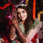 Shrenu Parikh Instagram - Mehendi rach gayi…🧿❤️ Let’s see how much he loves me…!?😜 #LoveAtFirstTake . Look Designed & Styled By :- @nehaadhvikmahajan . 👗Outfit:- @rajgharana.rg 💎Jewellery:- @floralartbysrishti Makeup hair by :- @thebigbangsalon Mehendi by:- @jayshreebridalmehandi Photography by :- @oragraphy Vadodara, Gujarat, India