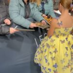 Sofia Sanchez Instagram - World Premiere in Berlin for @thehungergames The Ballad of Songbirds & Snakes 🕊️🐍 I had the time of my life meeting fans, signing autographs and watching the movie for the very first time! It is the most amazing film and I’m so proud! My dress is an homage to the working title of the film “Butterfly” as well as a nod to the butterfly symbol for Down syndrome awareness and my debut as an actress on the big screen. The colors yellow and blue are the colors of DS Awareness and my home country Ukraine. Truly a work of art by the amazing #houseofpetunia It was a night I will never forget! #corememory Custom Dress & Styling: @dolorispetunia 🦋 Hair & Makeup: @thesanchezsix 💫 Upper West Berlin