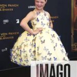 Sofia Sanchez Instagram - World Premiere in Berlin for @thehungergames The Ballad of Songbirds & Snakes 🕊️🐍 I had the time of my life meeting fans, signing autographs and watching the movie for the very first time! It is the most amazing film and I’m so proud! My dress is an homage to the working title of the film “Butterfly” as well as a nod to the butterfly symbol for Down syndrome awareness and my debut as an actress on the big screen. The colors yellow and blue are the colors of DS Awareness and my home country Ukraine. Truly a work of art by the amazing #houseofpetunia It was a night I will never forget! #corememory Custom Dress & Styling: @dolorispetunia 🦋 Hair & Makeup: @thesanchezsix 💫 Upper West Berlin