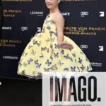 Sofia Sanchez Instagram - World Premiere in Berlin for @thehungergames The Ballad of Songbirds & Snakes 🕊️🐍 I had the time of my life meeting fans, signing autographs and watching the movie for the very first time! It is the most amazing film and I’m so proud! My dress is an homage to the working title of the film “Butterfly” as well as a nod to the butterfly symbol for Down syndrome awareness and my debut as an actress on the big screen. The colors yellow and blue are the colors of DS Awareness and my home country Ukraine. Truly a work of art by the amazing #houseofpetunia It was a night I will never forget! #corememory Custom Dress & Styling: @dolorispetunia 🦋 Hair & Makeup: @thesanchezsix 💫 Upper West Berlin
