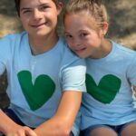 Sofia Sanchez Instagram - My brother and I will be on the big screen in Times Square tomorrow morning for the @ndss Buddy Walk! I love him SO much and together we have done amazing things. Earlier this year we released our second @scholastic picture book “You Are Loved” where we are on the cover together. Better together. Best friends forever. #youareloved #bigbrother #irishtwinsforthewin Times Square , New York