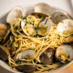 Stefano Faita Instagram - Prêts pour notre menu de la veille de Noël 100% poisson? Lien dans la bio pour tout savoir! 🐟 - Ready for our Feast of the Seven Fishes? The Italian traditional Christmas Eve dinner, from our family to yours. Link in bio to see the full menu. #feastofthesevenfishes #italianfood #italiantraditions #buonnatale #fishmeal #pescatarian #stefanofaita