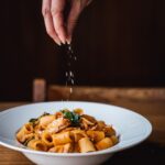 Stefano Faita Instagram - Ça y est, le chauffage est parti! C’est le temps des recettes pleines de chaleur et d’amour❤️‍🔥, comme mes mezzi rigatoni au ragù de pilons de poulet. Lien vers la recette dans la bio! . That’s it, we officially turned on the heating! Time for comforting recipes full or warmth and love ❤️‍🔥, like this mezzi rigatoni and chicken ragù. Click the link in our bio for the full recipe! #stefanofaita #pasta #food #italianfood #rigatonipasta #italiancooking