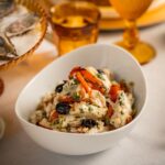 Stefano Faita Instagram - En Italie 🇮🇹 comme en Gaspésie ⚜️, chaque famille a sa recette traditionnelle de morue séchée. La nôtre, c’est l’insalata di baccalà, une des stars de notre festin des 7 poissons du 24 décembre. - In Italy 🇮🇹, like in Gaspésie ⚜️, every family has its own traditional recipe for dried and salted cod. Ours is insalata di baccalà, one of the stars of our 7-fish feast on December 24. Lien dans la bio / Link in bio 🔗 #stefanofaita #stefano #baccala #fishmeal