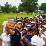 Stephen Curry Instagram - A great day in Ohio. On our final day at Firestone, @stephencurry30 showed up and cheered on the boys and girls as they finished on the 18th. Congrats to @juliavollmer05 @kjofahengauegolf and the entire field for another 🔥leg of the Tour. See y'all in Las Vegas! #ugtour #stayunderrated #golf