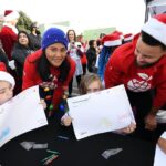 Stephen Curry Instagram - We celebrated our 11th annual Christmas with the Currys🎄by bringing the joy of reading to all 17,000 elementary school students in the Oakland Unified School District—delivering beautiful gift boxes of books to 49 schools. That’s 85,000 books total!📚 We also made an extra special delivery to 800 students at OUSD's Manzanita Campus, with the help of our village of volunteers and partners. Students received gift boxes of books, backpacks, and other holiday treats. Plus, we announced that Manzanita will be the first of eight @ousdnews campuses to get a revitalized schoolyard in 2024 in partnership with @eatlearnplay and @kaboom! 🎉 Thank you to the dedicated community of partners and volunteers who supported this year’s #ChristmaswiththeCurrys including @workday, @currybrand, @underarmour, @chase, @literatikids, @rakuten, and @warriors. 📷 @noahgphotos/@gettyimages