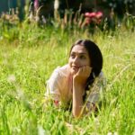 Suhani Dhanki Instagram - Vibing to that background music in my head! Nestled in nature with 📸 @simonphoto Wearing my sister's creation 👗 @payaldhanki #baharlahamadhumas #photography #fields #portrait #portraitphotography #actor #dancer #model
