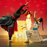 Suhani Dhanki Instagram - Magical Honey by @sanskruti_dance_cambridge Inspired by Matilda, this is the story of Maya who learns from Goddess Saraswati and teaches Headmaster Tusra a lesson! Photos by @simonphoto . . . I never imagined I'd love playing a mean character so much! But this show made for children and families brings me sooo much joy! Especially when little kids give feedback like, 'I liked when the Angry woman danced', 'The Headmaster falling was the best part' and the cutest of all is when my little Miraya asked her daddy, 'Mumma upset?', or cried 'Mumma fall down! Mumma wake up!!', or when she comes home and shows big eyes to her Grandma! This show has so much to offer - live music, storytelling with dance, audience interaction and the best of all, MAGIC!! After our premiere @cambridgejunction we will be performing at @nordenfarm in Maidenhead on 31 May. Lots more shows coming up in and around London! Stay tuned! . . . Credits: Concept and direction - Krishna Zivraj Performers - Linnea @cats_for_lenny Sia, Freya and myself Costumes - Zoe @zs.scrubs Set - Imogen @plimpsole_girl Magic consultant - @neilkelso Dramaturg - Chris Fogg Script - Aisha