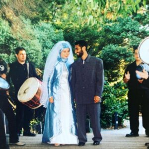 Susan Carland Instagram - 19 years ago today! Guys, I did my own make-up 🥲 💀(also: Men’s suits were massive back then) (yes, I was apparently foreshadowing a Muslim Elsa)